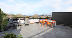 Seattle apartment for rent - A patio with a table and chairs.
