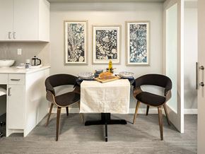 Seattle apartment for rent - a dining room with a table and two chairs