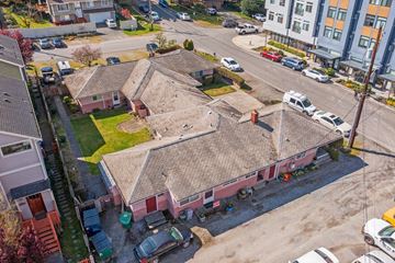 Seattle apartment for rent - an aerial view of a building with a roof and a parking lot