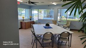 Orange City apartment for rent - A conference room with a long table and chairs.