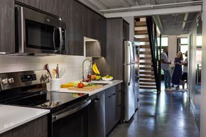 Lincoln apartment for rent - a kitchen with a sink and a stove and a refrigerator