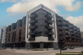 Lincoln apartment for rent - a large building with balconies on the side of a street