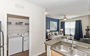 Fort Mill apartment for rent - kitchen and living room with a stove refrigerator and sink at Sycamore Fort Mill, South Carolina