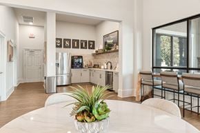Mooresville apartment for rent - A white table with a plant on it in a kitchen at Echo at Lake Norman, Mooresville