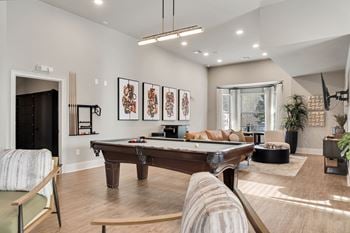 A living room with a po