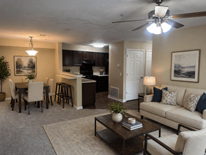 Lilburn apartment for rent - A living room with a couch, chairs, and a coffee table.