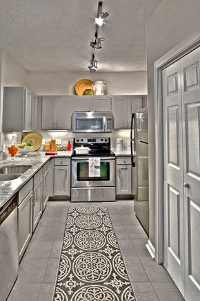 Atlanta apartment for rent - A modern kitchen with a patterned tile floor.