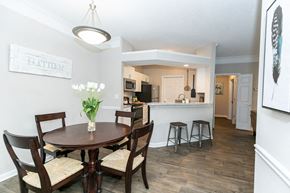 Kennesaw apartment for rent - model dining room and kitchen at The Mill at Chastain, Georgia, 30144