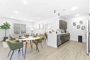 Newington apartment for rent - A modern kitchen with a dining table and chairs.