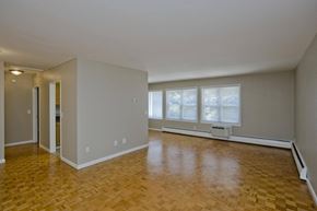 Springfield apartment for rent - an empty living room with a hard wood floor and a window at Park Edge, Springfield, Massachusetts