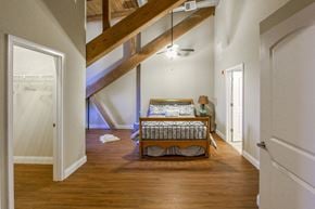 Taftville apartment for rent - an attic bedroom with a bed and a closet at Ponemah Mills in Taftville, CT, 06380