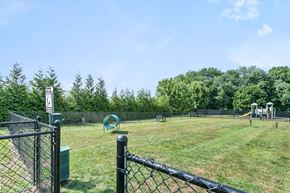 Norwich apartment for rent - a park with a playground and a chain link fence at Rose Hill Estates, Norwich, CT, 06360