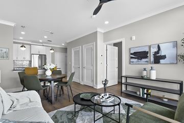 Yorktown Heights apartment for rent - A modern living room with a dining table and chairs.