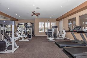 Pittsburg apartment for rent - A well-equipped gym with treadmills, weights, and cardio machines.