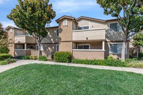 Pittsburg apartment for rent - A large apartment complex with a well-maintained lawn in front.