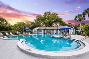 Brandon apartment for rent - View of Brookside Manor Pool Deck looking towards the Clubhouse with sunset in background