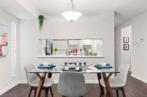 River Ridge apartment for rent - A dining room with a glass table and chairs.