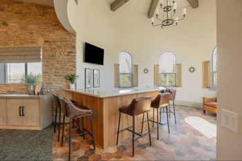 A bar area with a tv