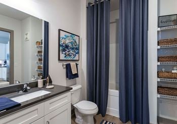 Spacious bathrooms with roman soaking tubs