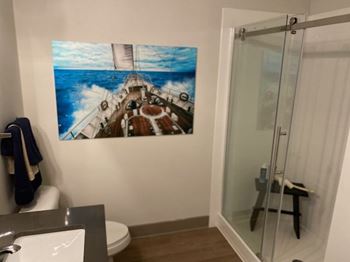 Walk-in showers with frameless glass doors*