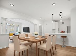 Cary apartment for rent - A dining room with a wooden table and chairs.