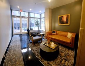 Philadelphia apartment for rent - A living room with a couch, chair, and coffee table.