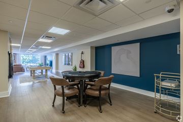 Nashville apartment for rent - A conference room with a table and chairs.