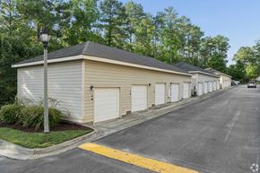 Cary apartment for rent - A row of garage doors are closed.