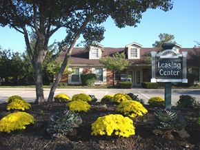Indianapolis apartment for rent - the leasing center sign in front of a leasing center building