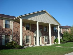 Indianapolis apartment for rent - the front of a brick building with columns