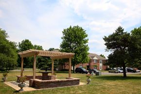 Indianapolis apartment for rent - a park with a pavilion and a fire pit