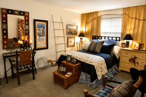 Indianapolis apartment for rent - A bedroom with a bed, dresser, and chair.