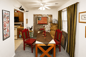 Indianapolis apartment for rent - A dining room with a wooden table and chairs.
