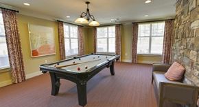 Scottdale apartment for rent - decatur affordable family apartment a game room with a pool table and a stone wall