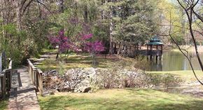 Stone Mountain apartment for rent - affordable section 8 stone mountain a park with a lake and a gazebo