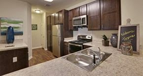 Scottdale apartment for rent - decatur affordable family apartment a kitchen with stainless steel appliances and granite counter tops