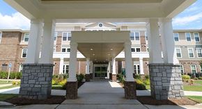 Stone Mountain apartment for rent - a view of the entrance to a building with pillars