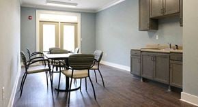 Scottdale apartment for rent - a kitchen and dining room with a table and chairs