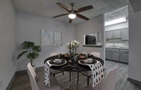 Stone Mountain apartment for rent - a dining room with a table and a ceiling fan