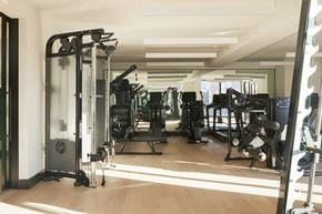 Philadelphia apartment for rent - a gym with a lot of exercise equipment in it