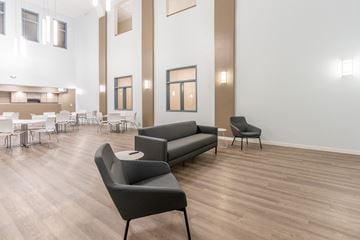Mt Union apartment for rent - a living room with two couches and chairs and a table and chairs