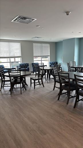 Monaca apartment for rent - A room with wooden floors and chairs.