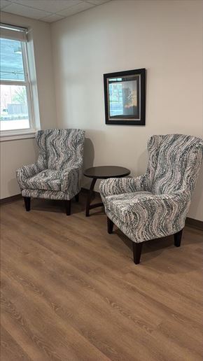 Monaca apartment for rent - Two chairs with a small table between them.