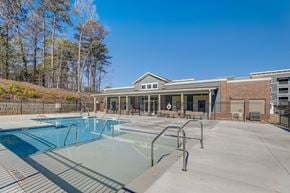 Atlanta apartment for rent - our apartments have a pool with a building in the background