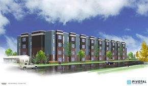 Lansing apartment for rent - a rendering of an apartment building from the street