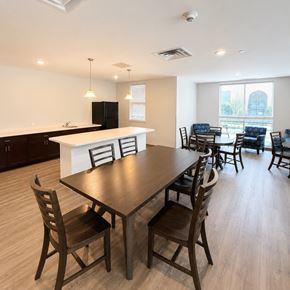 Monaca apartment for rent - A dining room with a table and chairs.