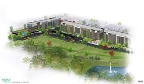 Arlington apartment for rent - an aerial view of the development with buildings and a fountain