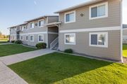 Billings apartment for rent - a sidewalk in front of a building with grass at Shiloh Glen, Billings Montana