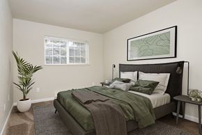 University Place apartment for rent - Bedroom with queen size bed, two side tables, and window at University Glen, University Place, 98466