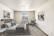 East Wenatchee apartment for rent - a bedroom with a bed and a chair in a 555 waverly unit  at Altitude, East Wenatchee